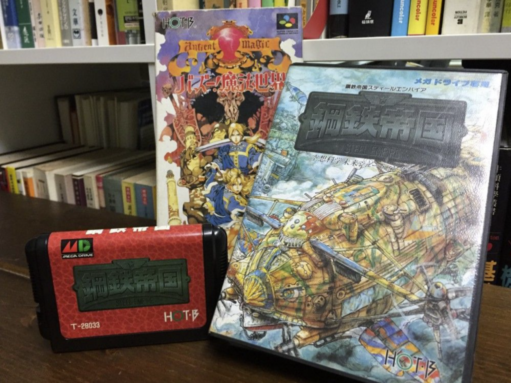 《鋼鐵帝國》MD版盒裝及卡帶。