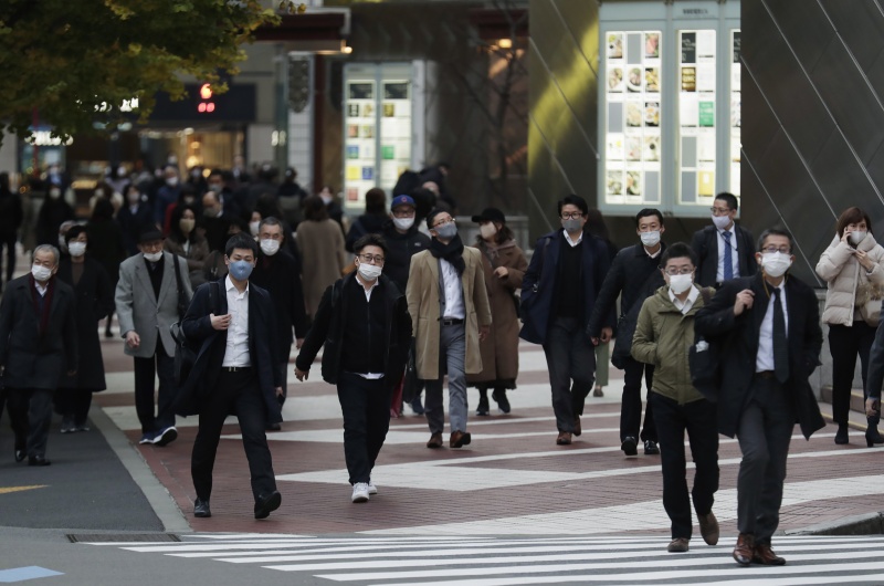 ▲日本東京都今天通報新增678例新型冠狀病毒確診案例，超越12月12日的621例。（圖／美聯社／達志影像）