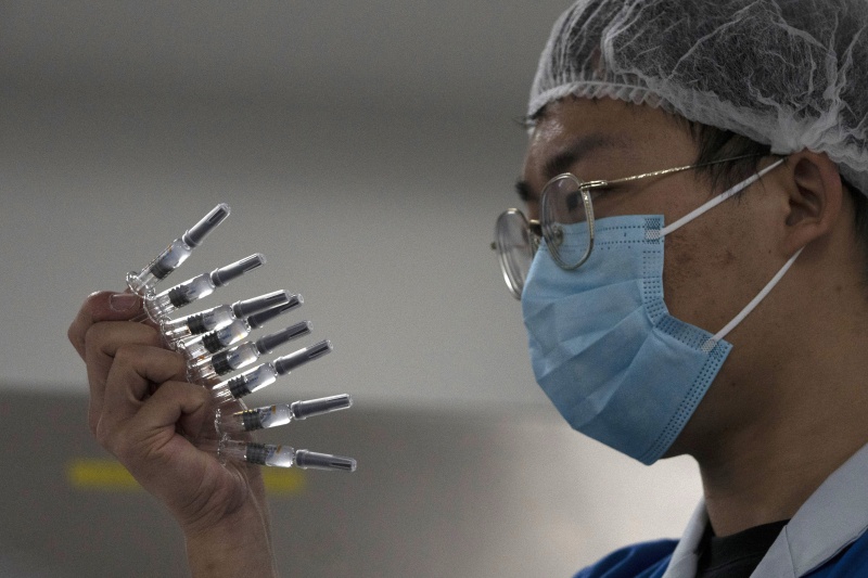中國宣布疫苗全國開打　號稱「至少半年免疫」
