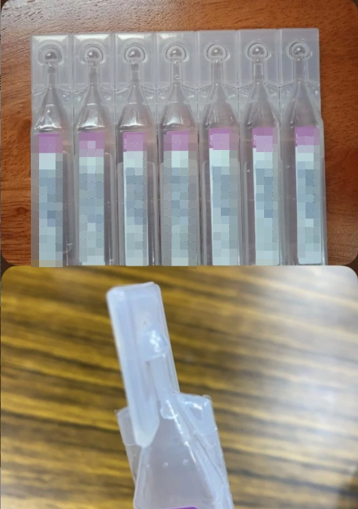 ▲原PO發現只要將蓋子硬塞回去,就能夠使食鹽水不漏出來。(圖/翻攝Dcard)