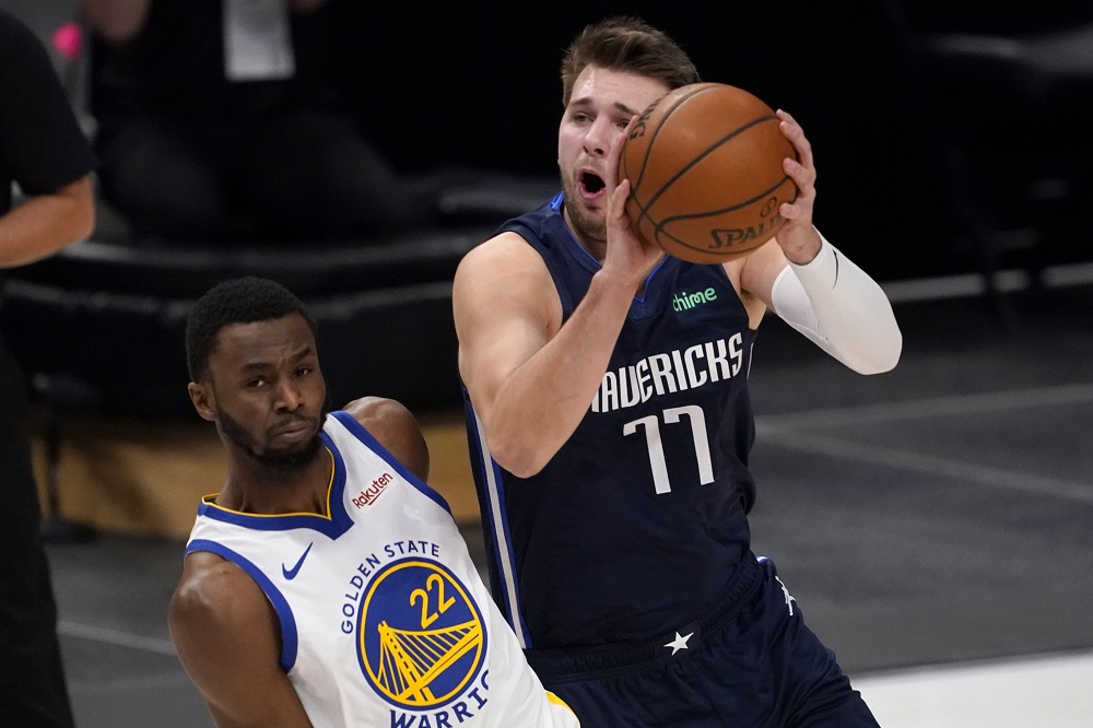 ▲Luka Doncic面對Andrew Wiggins的防守，並不好進攻。（圖／美聯社／達志影像）