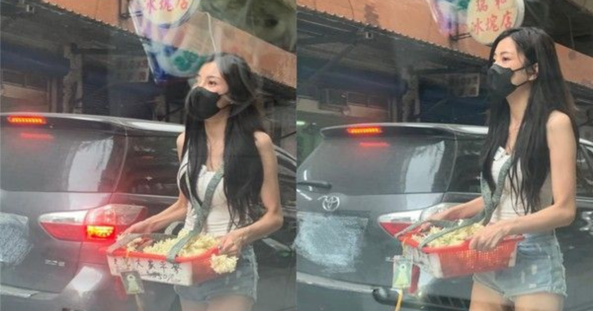 ▲長腿正妹在建國北路上紅燈時拿出花籃，向路過駕駛兜售「玉蘭花」，在網路上引發話題。（圖／翻攝爆廢1公社）