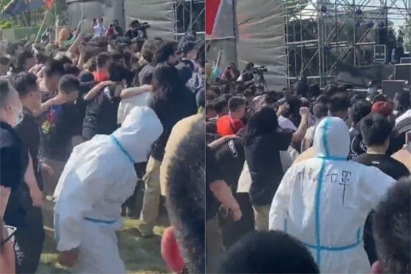 ▲男子穿著防護衣熱舞,讓在場的民眾擔心他可能會中暑。(圖/翻攝自《頭條新聞》