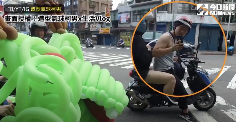 ▲街頭民眾紛紛拿起手機拍照。(圖/造型氣球柯男
