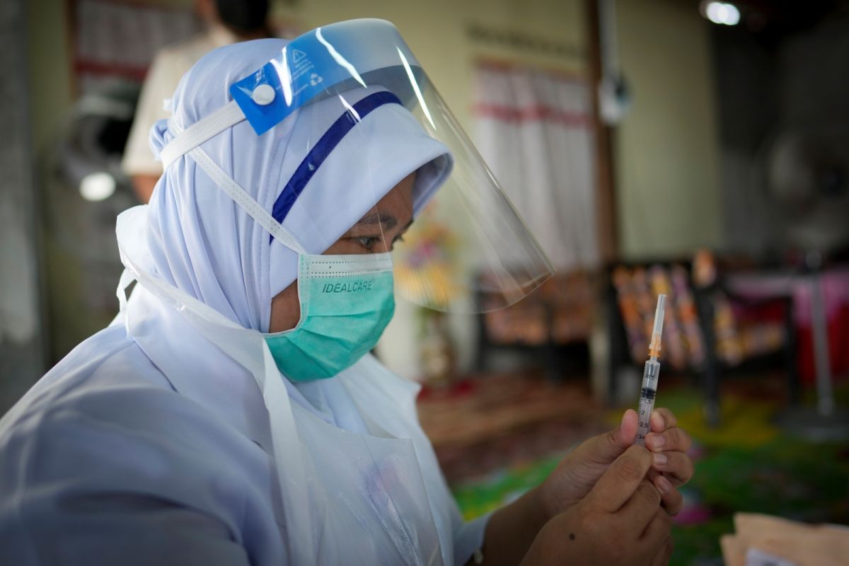 ▲馬來西亞疫情趨緩，成人疫苗覆蓋率也超過9成。資料照。（圖／美聯社／達志影像）