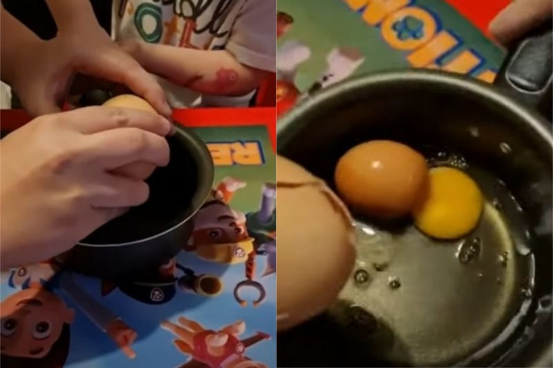 ▲奧莉弗敲開巨蛋後，發現裡面除了蛋黃、蛋白，竟然還有一顆雞蛋。（圖／翻攝自《SWNS》YouTube）
