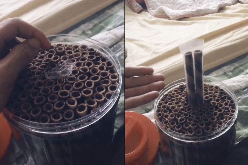 ▲網友分享買了整桶脆笛酥，結果裡頭有兩支獨立包裝，讓他不懂有什麼用途。（圖/抖音＠b_g0221）