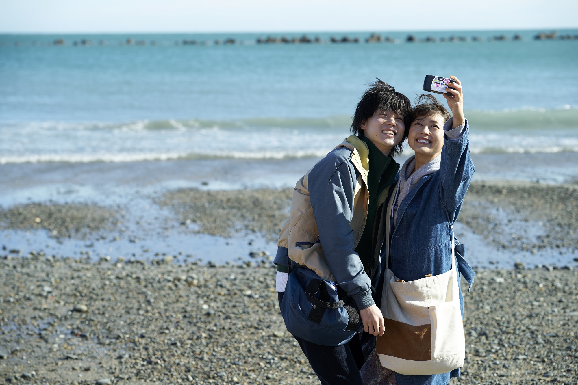 ▲菅田將暉（左） 與有村架純首次正式合作，就創下38億元日幣的票房。（圖／車庫娛樂提供）