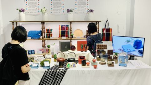 ▲位於華山文創園區未來市的「日本東北物產展」，展期即將接近尾聲，民眾紛紛前往體驗日本東北的人文風情。（圖／林辰勳拍攝）