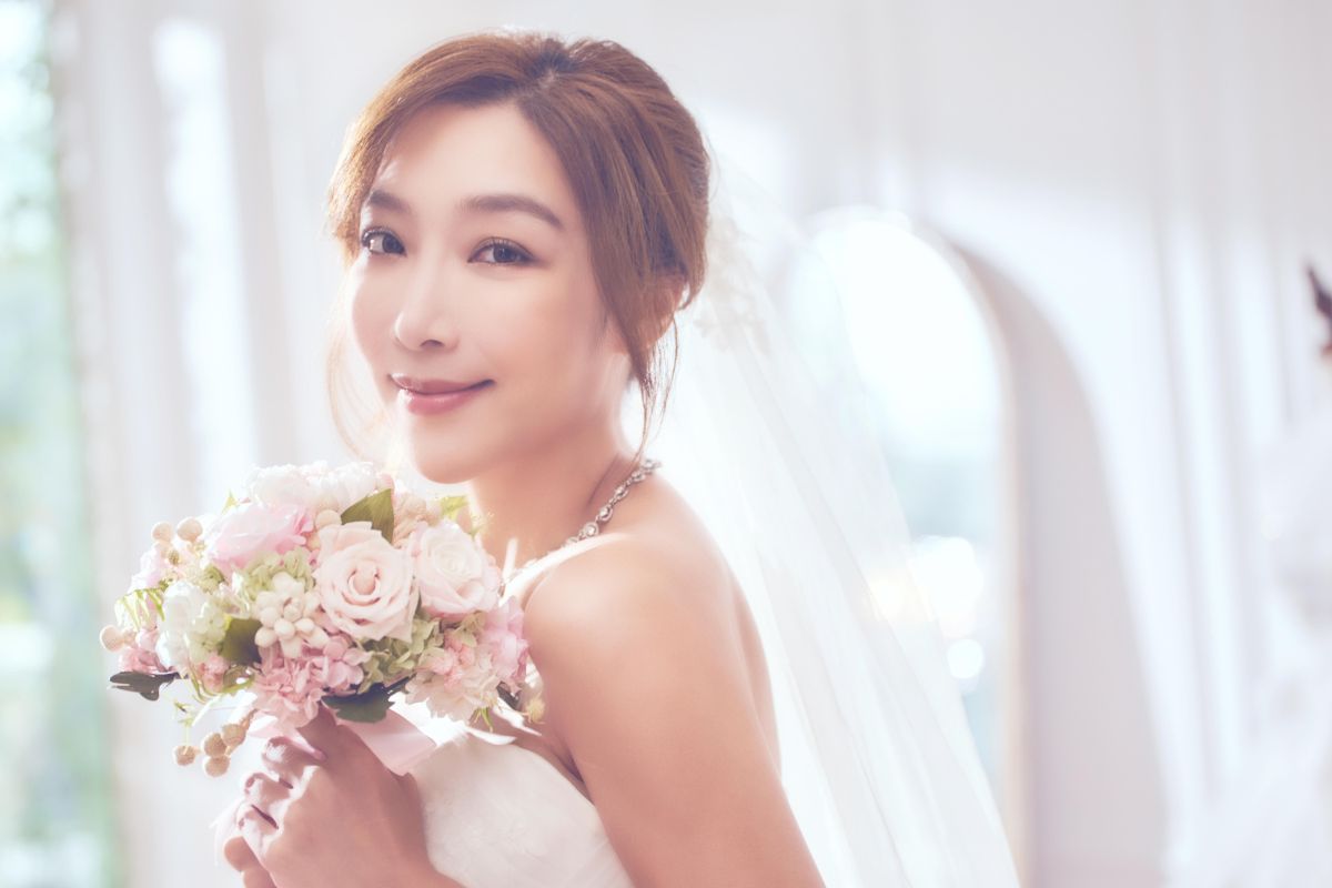 ▲李宓和老公阿Q，今年9月才剛補辦完婚宴，近日又宣布懷上「雙胞胎」。（圖／亞凰國際娛樂提供）