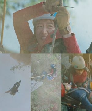 ▲劇中,全智賢帥氣跳山救組員。(圖/愛奇藝國際站) ▲劇中,全智賢帥氣跳山救組員。(圖/愛奇藝國際站)