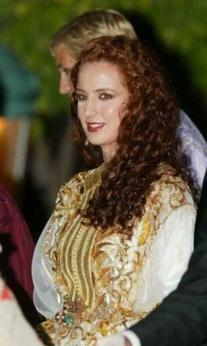 ▲一頭秀麗的紅色長捲髮，是薩爾瑪最著名的標記。（圖／翻攝自HRH Princess Lalla Salma Of Morocco臉書）