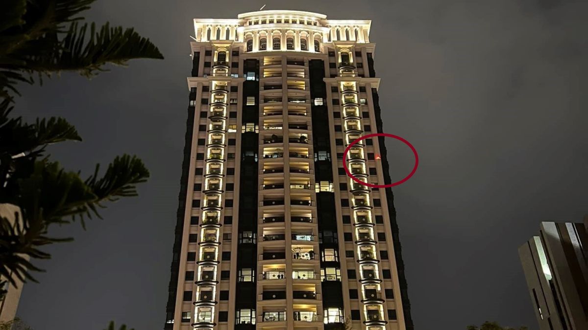▲網友好奇大樓側邊的紅色光點，有何特殊的用途？（圖／取自《買房知識家（A你的Q）》）