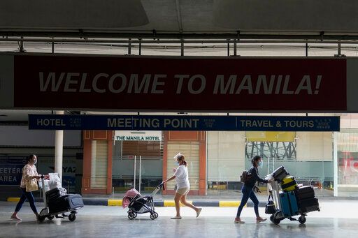 ▲菲律賓政府決定於10日向國際遊客開放國門後，菲律賓移民局目前正在積極準備。（圖／美聯社／達志影像）