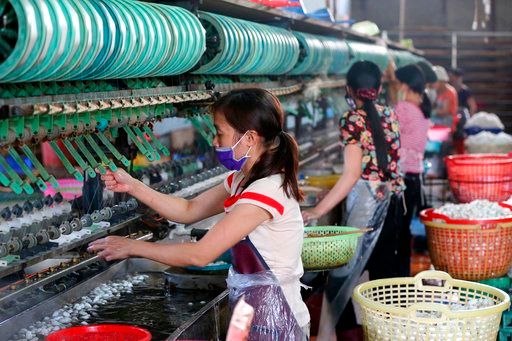 ▲越南紡織業者可能會迎來疫情後的反彈行情。（示意圖／美聯社／達志影像）