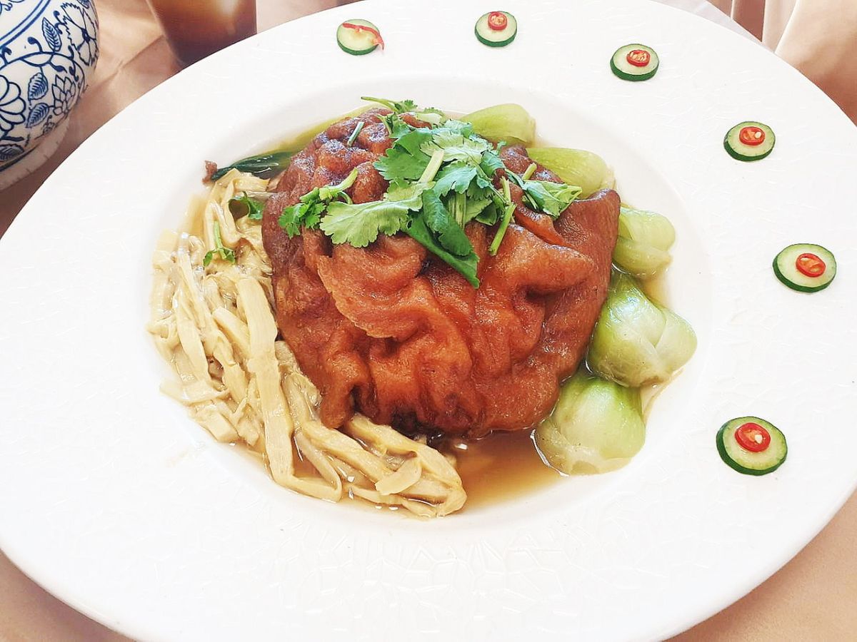 ▲為宣傳內門總舖師的絕佳手藝，高市府觀光局舉辦「封肉大胃王」比賽。（圖／高市府觀光局提供）