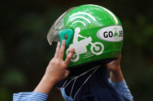 ▲由印尼叫車服務台Gojek和電商平台Tokopedia合併的超級獨角獸公司GoTo集團將於4月出在印尼證交所上市。（圖／美聯社／達志影像）