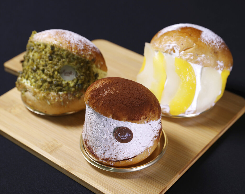 ▲夾有大量鮮奶油的義大利甜食Maritozzo（羅馬生乳包），是日本「悖德美食」旋風的頭號代表。（圖／美聯社／達志影像）