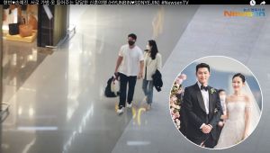 ▲玄彬(左)貼心幫老婆孫藝真拿包包。(圖/뉴스엔·NewsenTV·KOREA Entertainment news YouTube) ▲玄彬(左)貼心幫老婆孫藝真拿包包。(圖/뉴스엔·NewsenTV·KOREA Entertainment news YouTube)