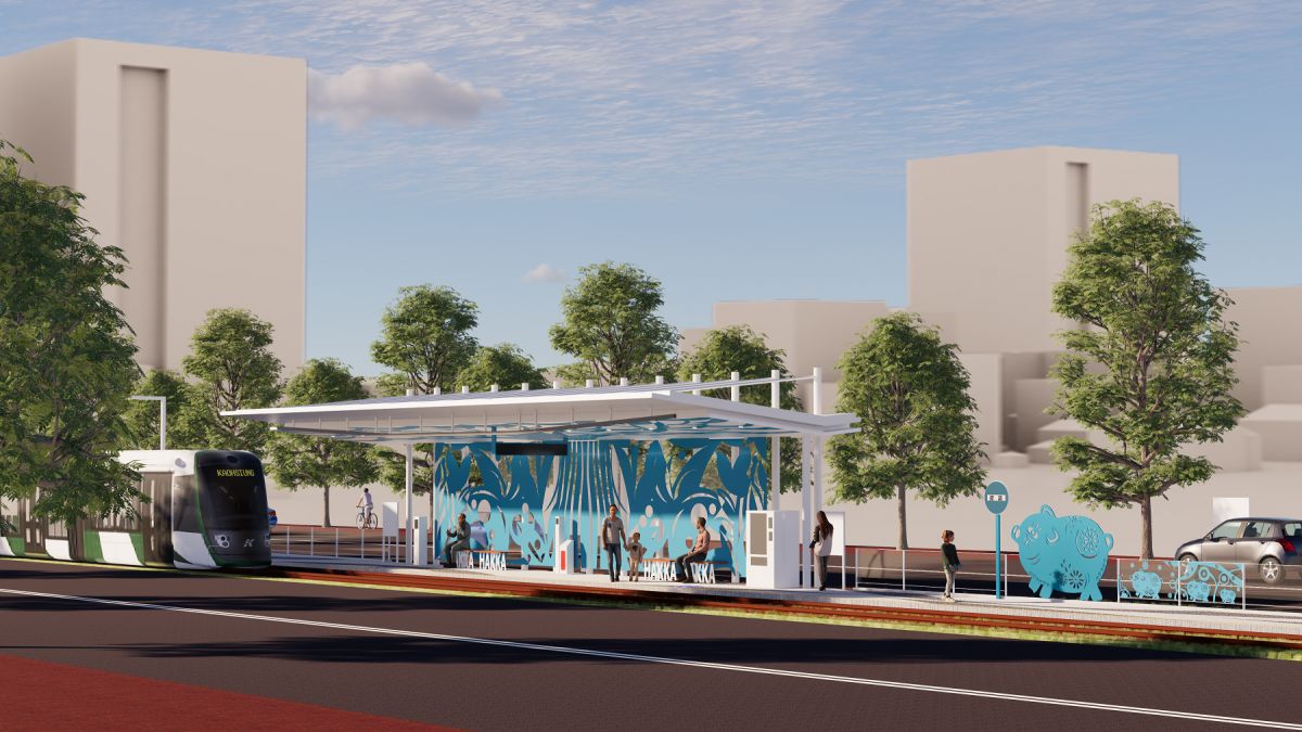 ▲高雄輕軌C24車站建築設計以客家剪紙意象作為車站特色，結合客家藍色系花布設計融入都市景觀。（圖／高市府捷運局提供）