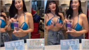 店員換上性感比基尼,引千名網友暴動。(圖/截取自《爆廢公社》) ▲店員換上性感比基尼,引千名網友暴動。(圖/截取自《爆廢公社》)