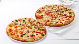 ▲「四喜披薩」系列可一次吃到4種口味，深受台灣民眾喜愛。（圖／達美樂提供）