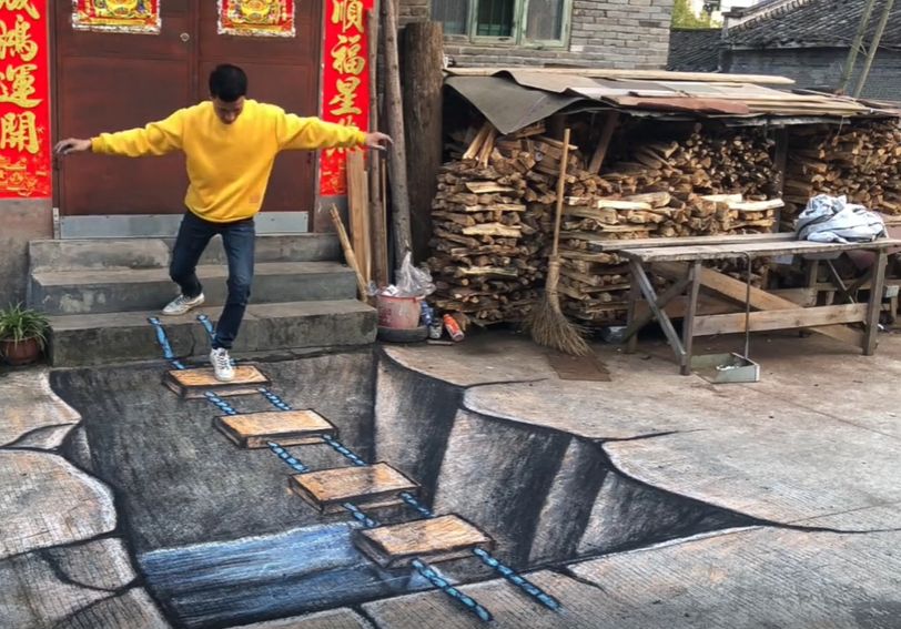 ▲中國福建1名年輕小夥子張世先，憑藉出色的3D繪畫技術，近幾年在中國網路上搏得不少關注。（圖／擷取自抖音影片）