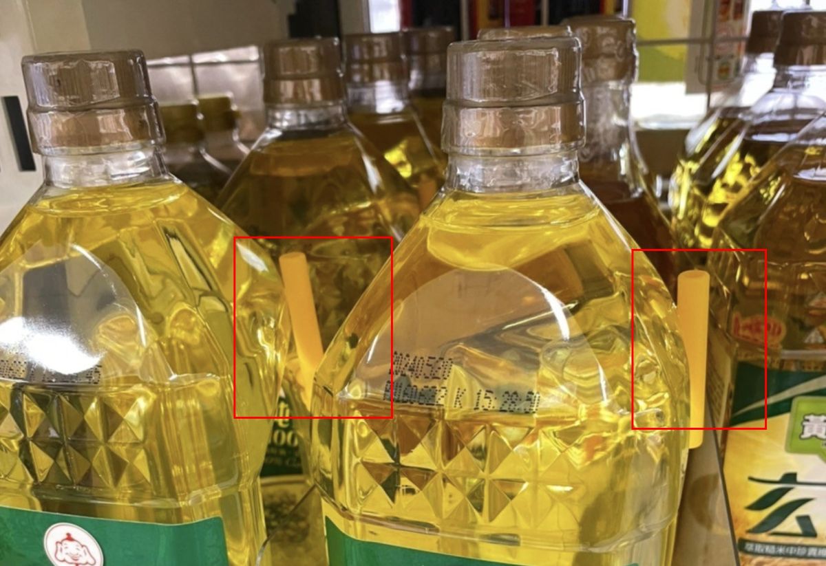 ▲網友分享自己去全聯買油時，發現瓶子外有附贈小吸管，好奇用途為何。（圖/我愛全聯好物老實說）