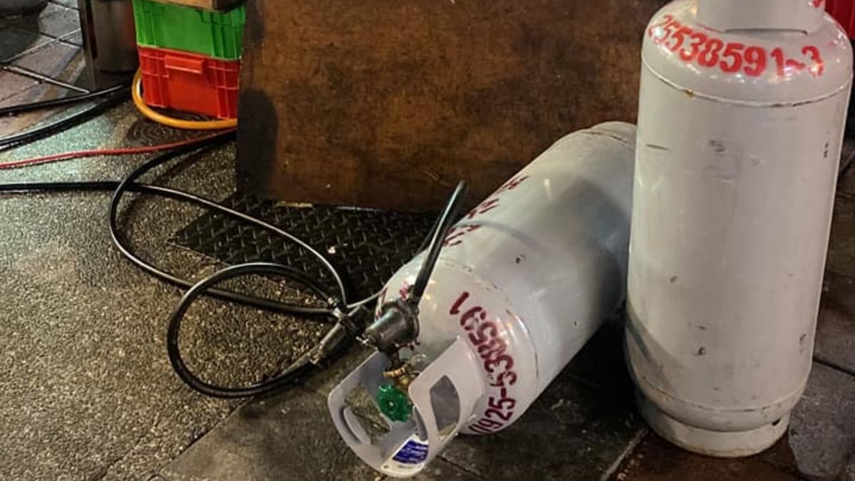 ▲有網友發現，有夜市攤販把瓦斯桶橫著放，讓他覺得很好奇可以這樣做嗎？結果網友們竟評價兩極，意外掀起戰爭。（圖／爆廢公社公開版）