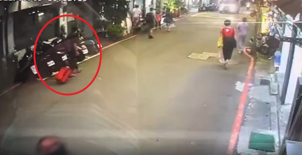 ▲監視器畫面顯示，有一名戴著口罩、身形與梁男大哥相似的男子，每天都拖著一個行李箱外出（紅圈處），目前警方尚在調查釐清中。（圖／翻攝畫面）