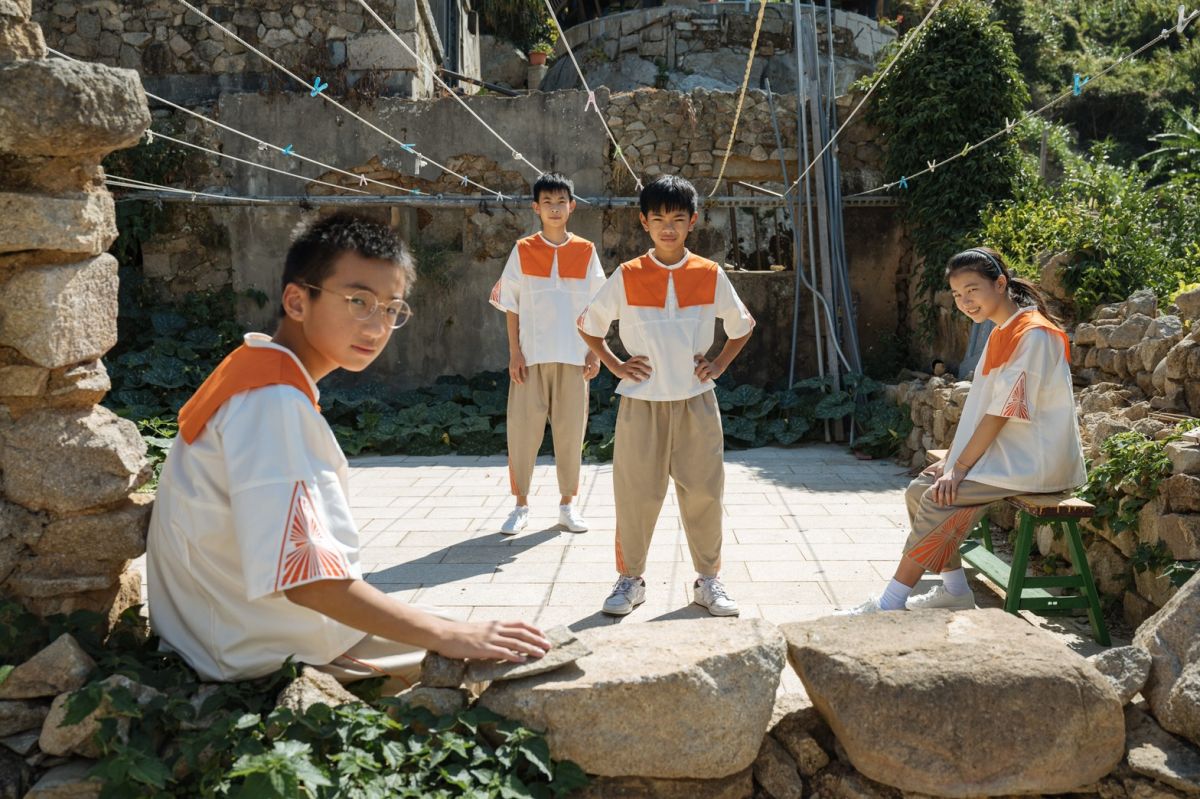 ▲馬祖兒童合唱團將在國慶典禮領唱國歌，文總邀請設計師打造新裝、藏馬祖「風燈」意象。（圖／文總提供）