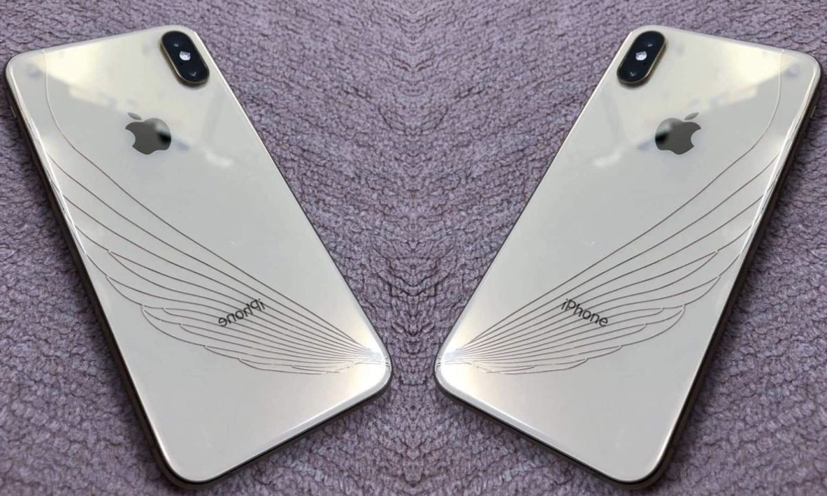 ▲一名網友把手機不慎摔在地上，結果竟然摔出天使的翅膀。（圖/推特＠haniwack）