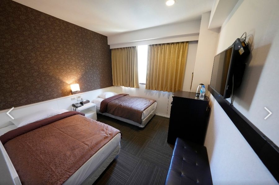 ▲文大與北投溫泉飯店合作供250床住宿，單人每學期2.8萬租金。（圖／文大提供）