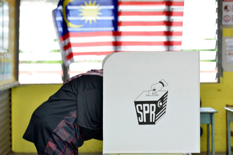▲馬來西亞十九日舉行國會選舉，這是馬來西亞修憲將投票年齡門檻降低到18歲以及實施自動選民登記制度後首次大選，（圖／美聯社／達志影像）