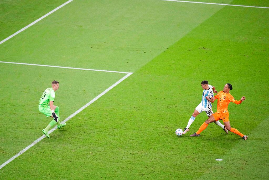 ▲阿根廷靠著梅西漂亮助攻，8強賽先馳得點（圖／美聯社／達志影像）