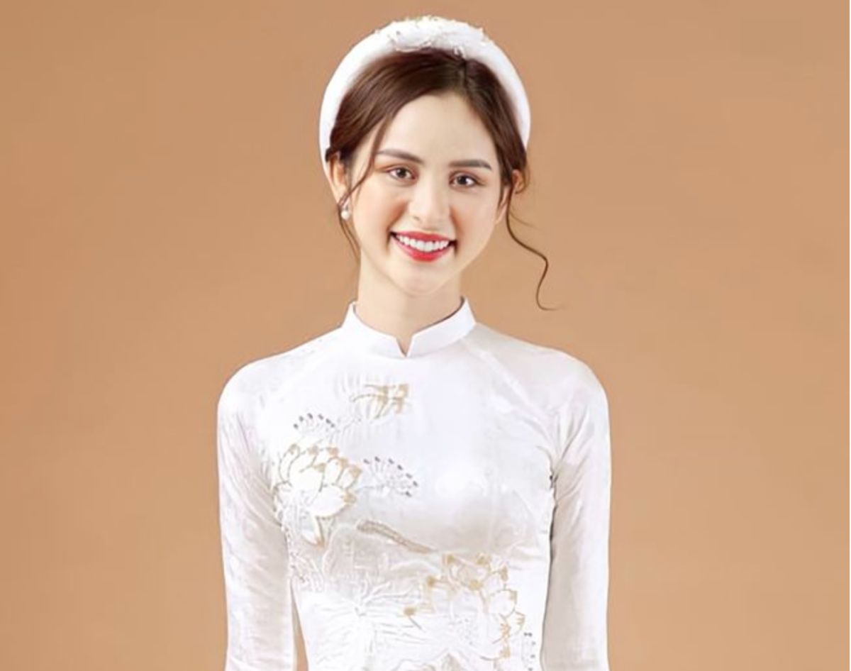 ▲越南變性網紅阮範向外型出眾，穿上越南傳統服飾奧戴更多了知性美。（圖／翻攝自緬甸中文網）