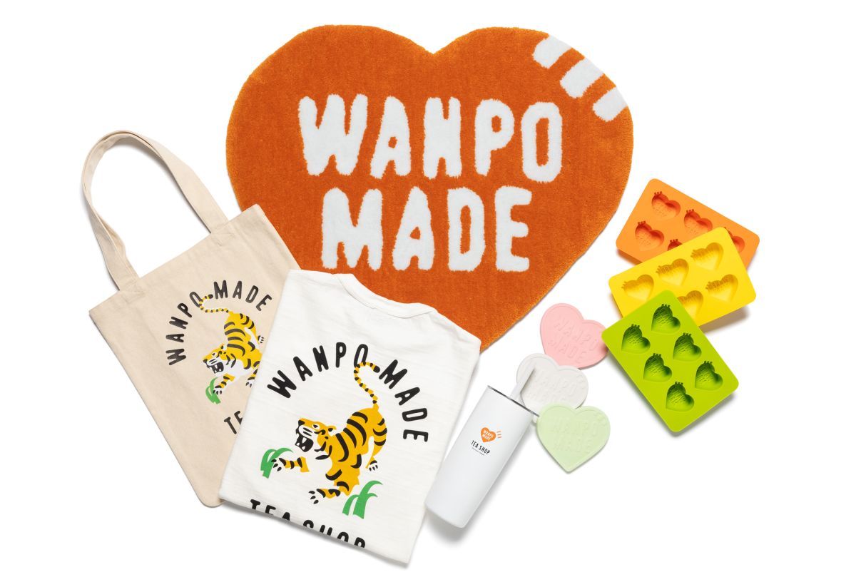 ▲手搖飲「萬波島嶼紅茶」聯名日本潮牌HUMAN MADE，超狂打造聯名飲品與一系列台灣限定「WANPO MADE」橘色愛心周邊商品，2/11起搶先曝光，2/14開賣超萌T恤、冰塊盒、帆布袋、地墊，甚至還有杯墊和保溫杯。（圖／翻攝自萬波官網）