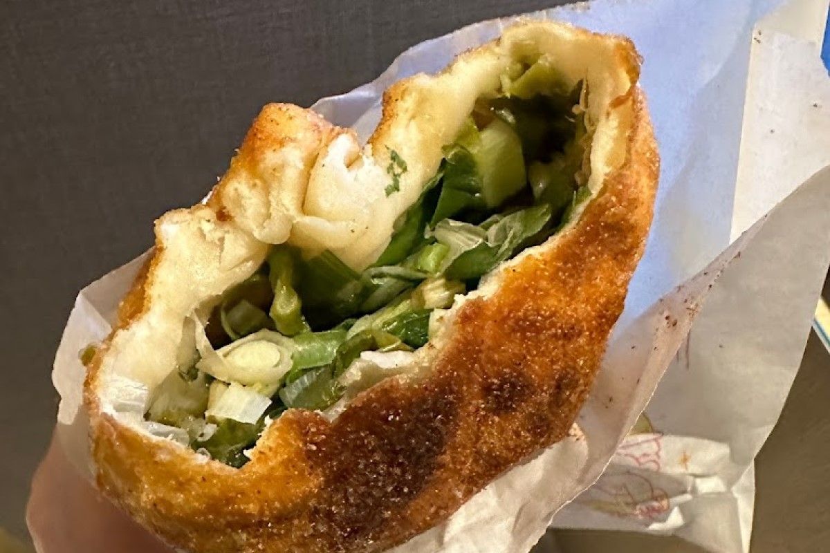 ▲近日傳出宜蘭某家蔥多餅店在結帳時使出「魔術手法」，有網友現身表示自己也曾遇到。（圖／google評論）