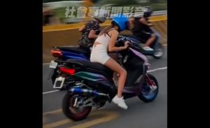 台15線大園段成機車賽道　長腿妹遮牌機車狂飆
