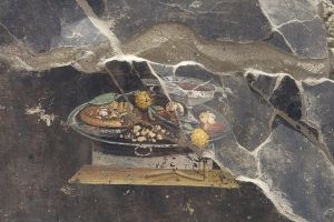 古羅馬人就懂吃披薩？龐貝遺址發現酷似披薩的壁畫　上面鋪水果
