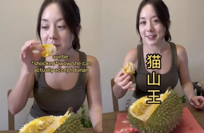 ▲一名美國籍女子在新加坡嘗試吃當地特色「貓山王」榴槤。（圖／翻攝自影片）