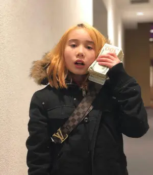 ▲Lil Tay靠著炫富爆紅，IG擁有百萬粉絲追蹤。（圖 / Lil Tay IG）