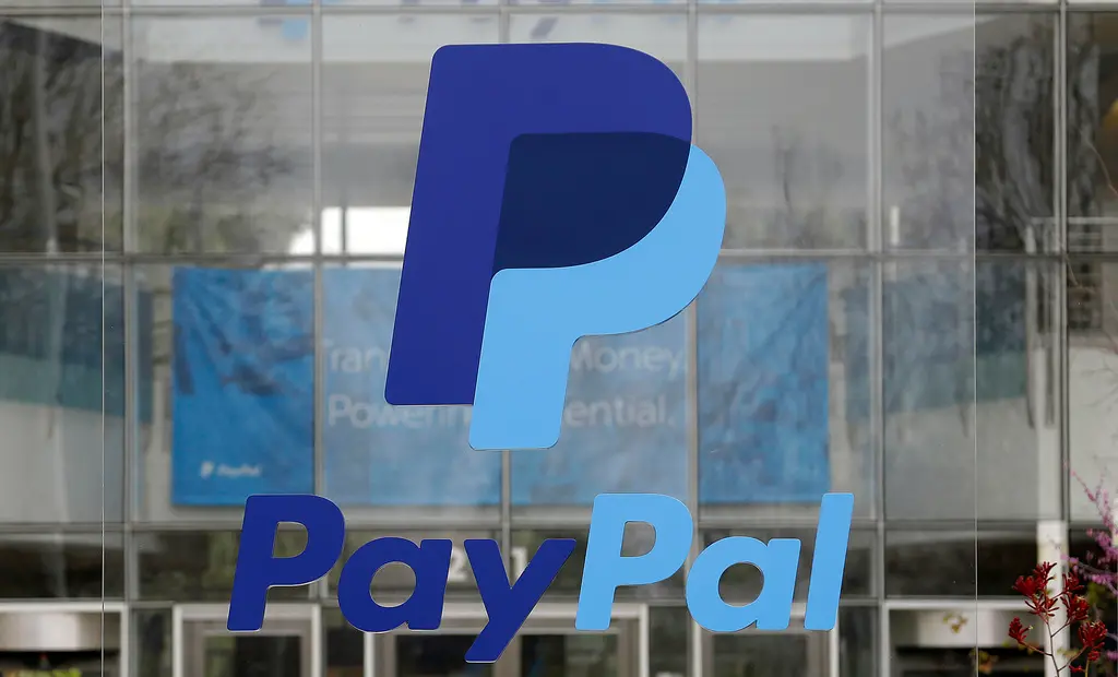 ▲支付業巨擘PayPal公司在加州宣布，要攜手信託業者Paxtos發行穩定幣，取名PayPal USD，引發市場震撼。（圖／美聯社／達志影像）