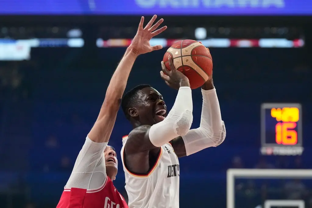 ▲德國當家球星Dennis Schroder僅上場23分鐘，就高效率貢獻16分和7次助攻。（圖／美聯社／達志影像）