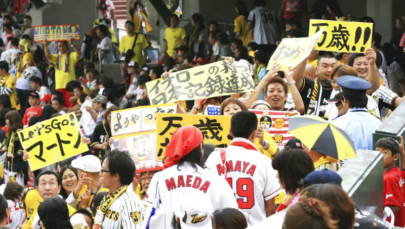 ▲阪神虎球迷十分瘋狂，若奪冠有球迷會跳河，還會大遊行。（圖／阪神虎推特）