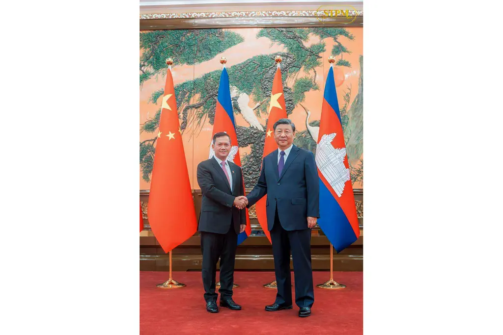 ▲柬埔寨總理洪馬內14日至16日訪中，雙方並發布聯合公報。當中指出，不斷深化兩國國家及地方警察在打擊跨境賭博、電信詐騙等執法領域的務實合作和能力建設，展開「一帶一路」重大項目安保合作。（圖／美聯社／達志影像）