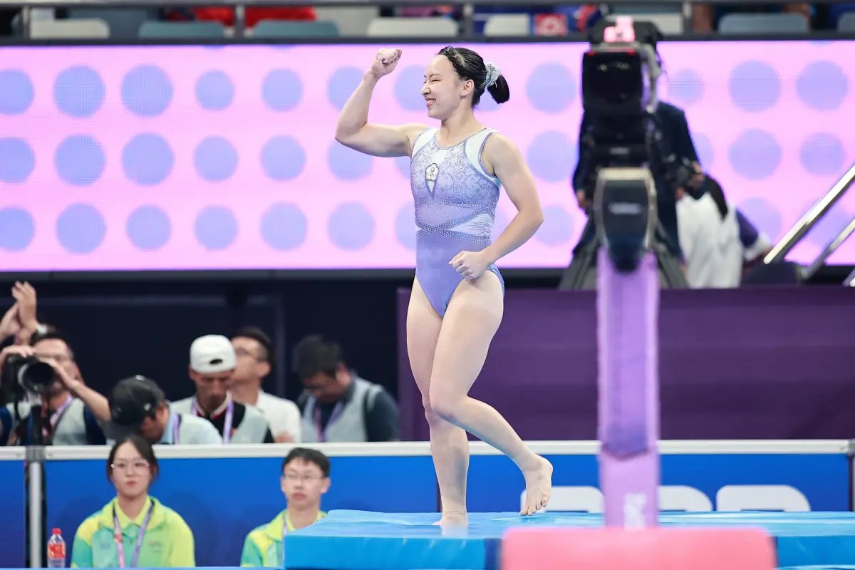 ▲杭州亞運競技體操女子個人單槓決賽登場，丁華恬拿下銅牌，寫下史上新猷。（圖／特派記者葉政勳攝）
