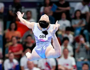 ▲杭州亞運競技體操女子個人單槓決賽登場，丁華恬拿下銅牌，寫下史上新猷。（圖／特派記者葉政勳攝）