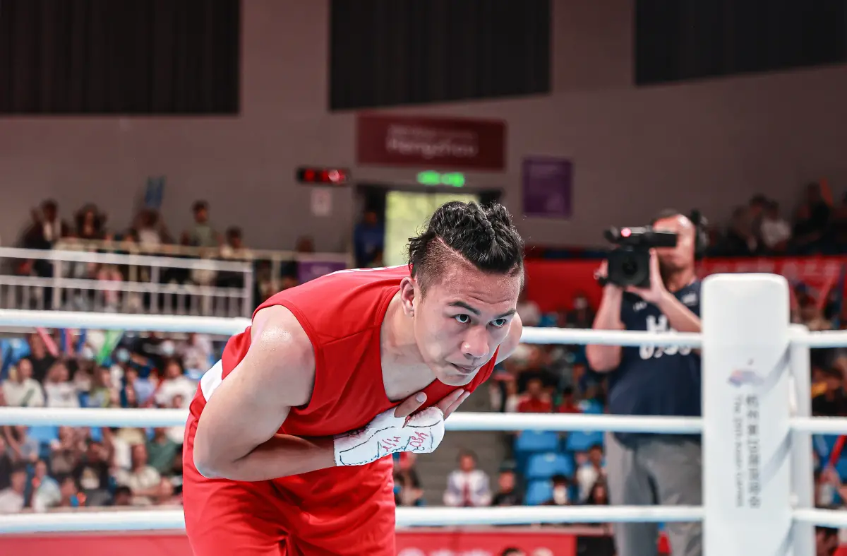 ▲原住民戰士甘家葳頂著超殺的「武士頭」造型，站上杭州亞運拳擊擂台，就拿下銀牌。（圖／特派記者葉政勳攝）