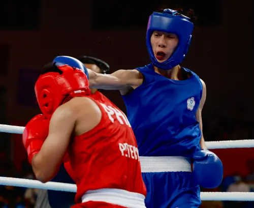 ▲林郁婷在杭州亞運女子57公斤級金牌戰中戰勝對手，奪下金牌。（圖／中華奧會提供）